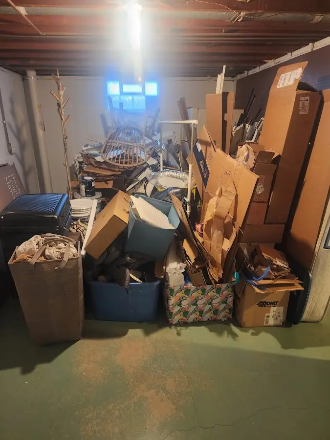 Roll-off dumpster container at job site for 15 Yard Dumpster Rental in Plainsboro